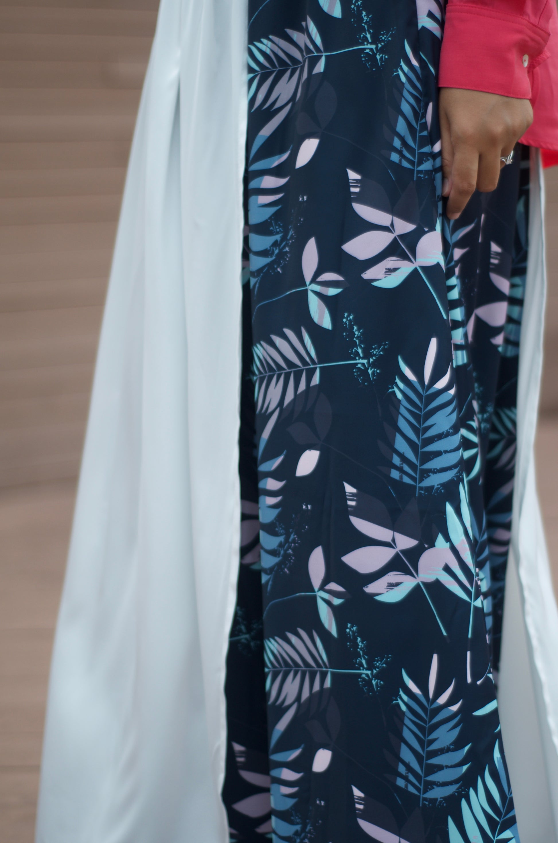 A floral-patterned skirt with a plain background
