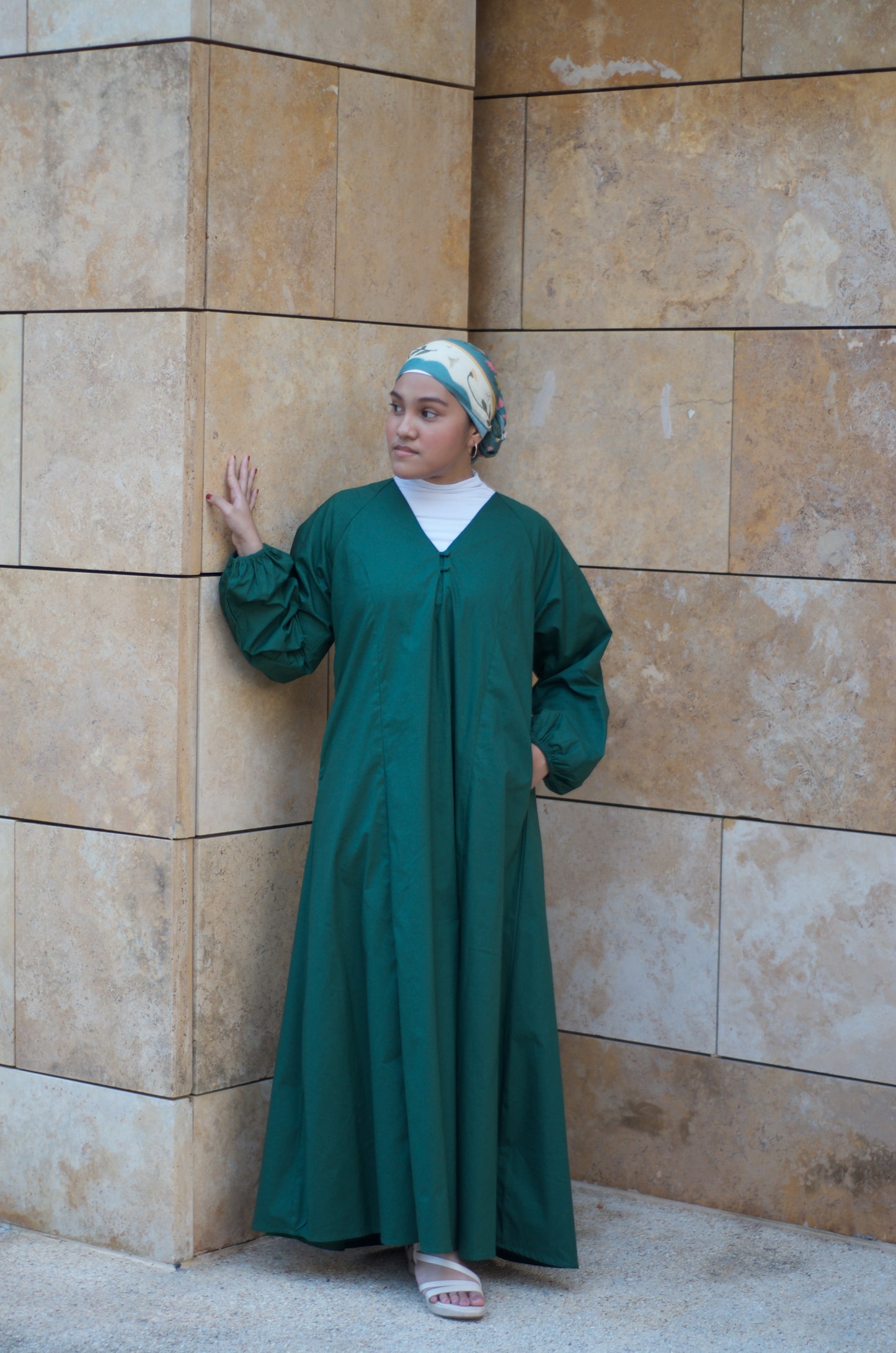 A forest green maxi dress with A-line cut